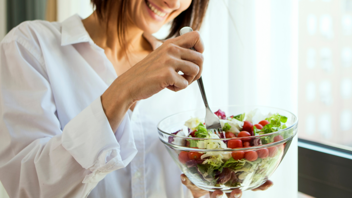A woman eating healthy food